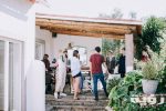 people standing under the awning 1666467 scaled