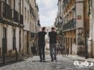 two man walking in between of buildings toward with concrete 1187520 scaled